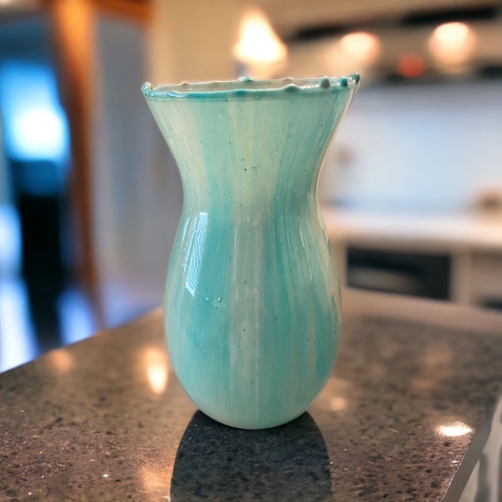 Green handmade resin bowl and matching vase.